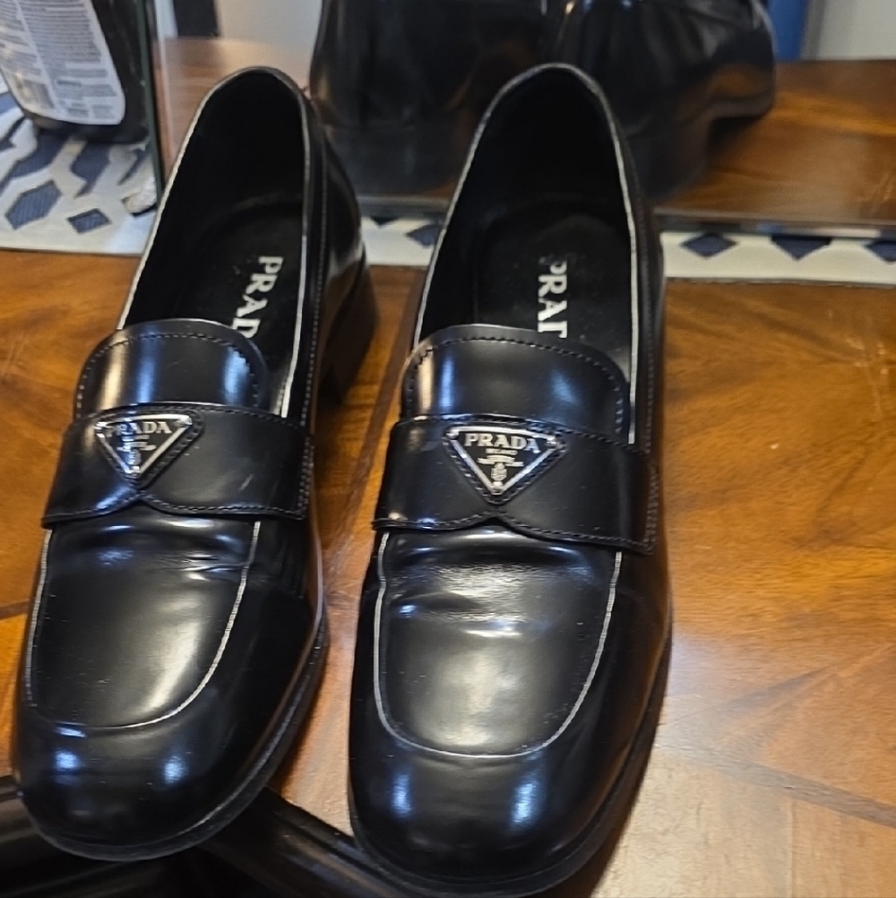 Prada Black Leather Penny Loafers with Triangular Logo